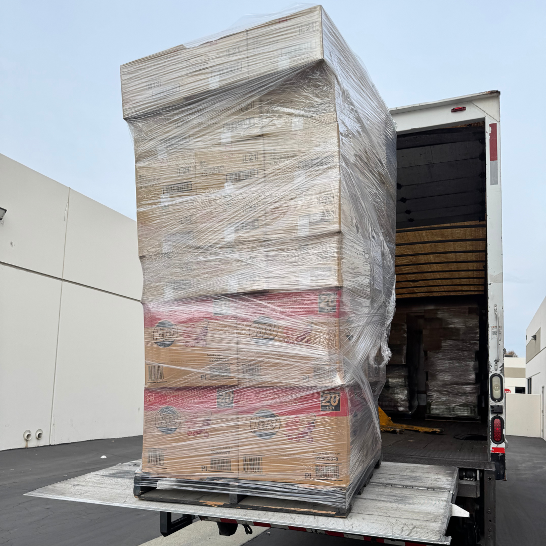 A stack of boxes wrapped in plastic